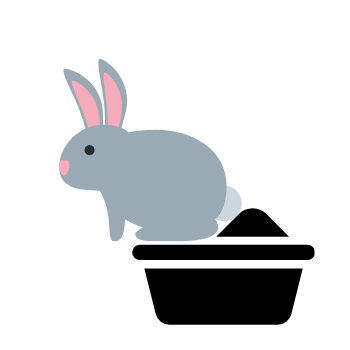 Image of a rabbit in a litter pan.